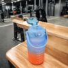 BUTELKA MOTYWACYJNA NA WODĘ BIDON 1,5L - niebiesko-pomarańczowy